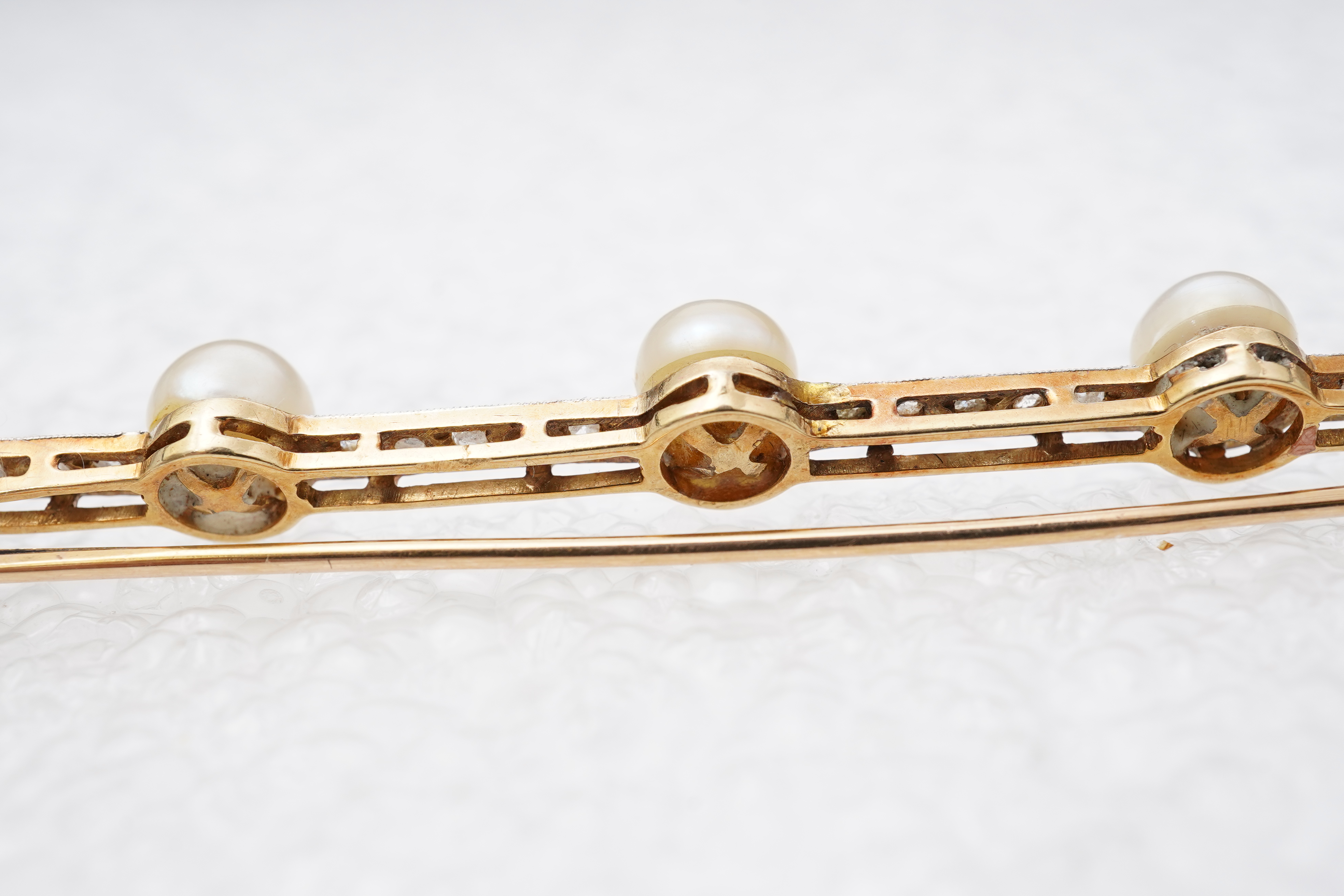 A pearl and diamond bar brooch, France, early 20th century